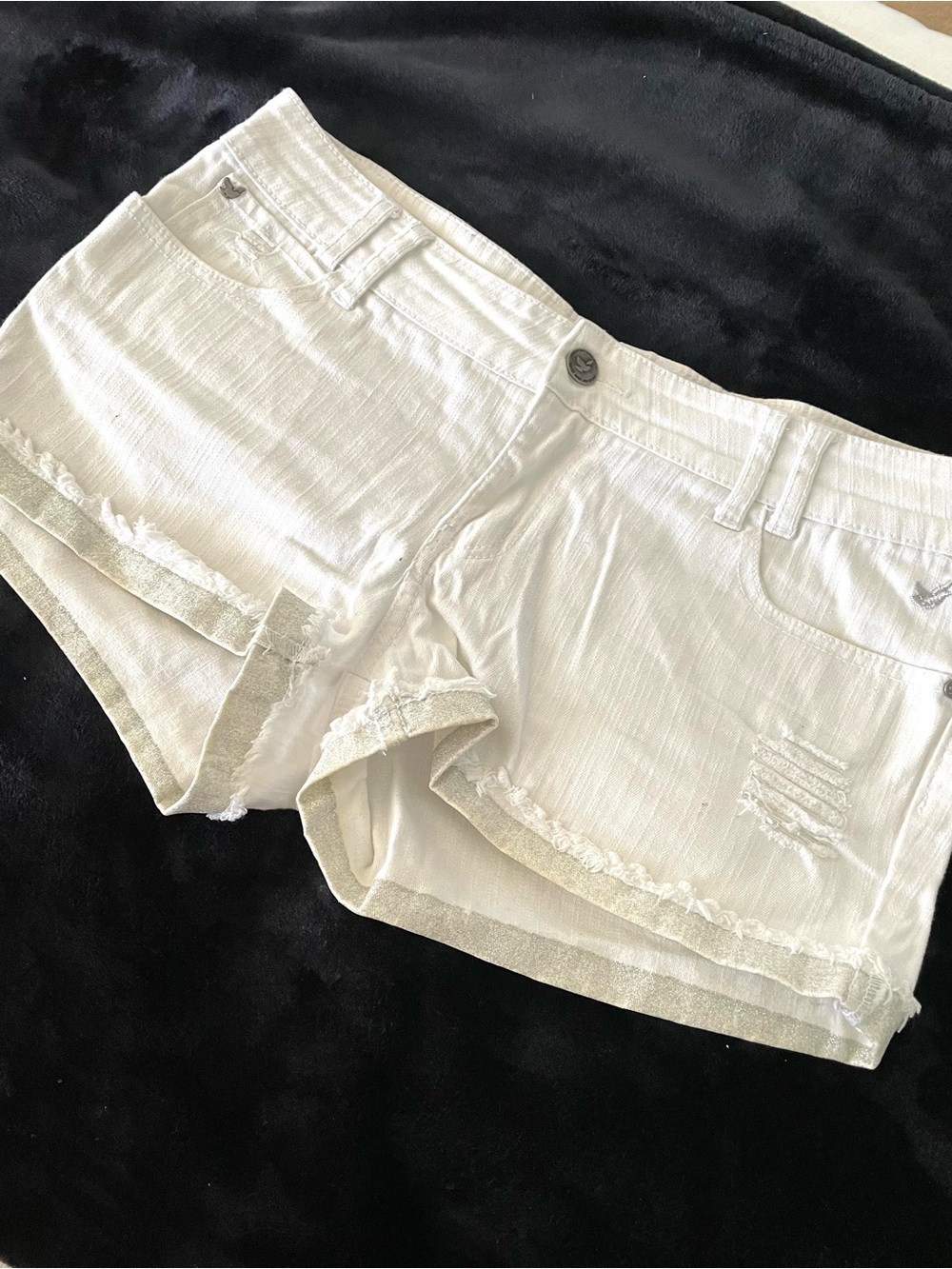 Selena Gomez white Denim distressed shorts